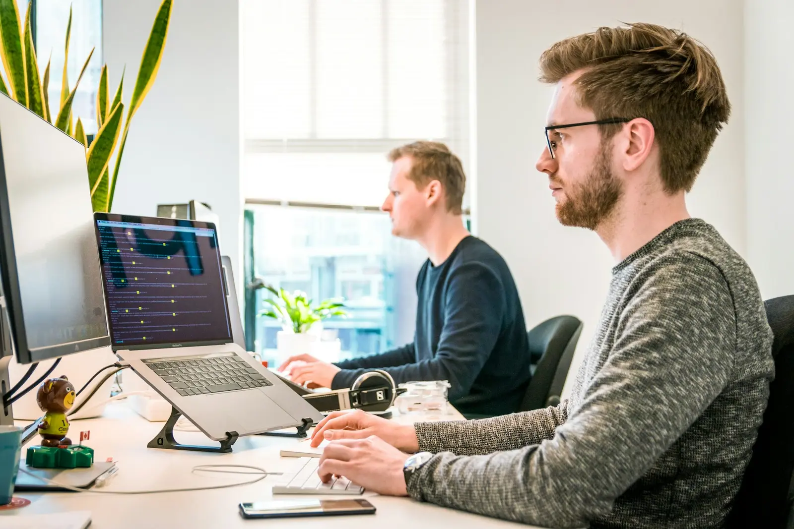 Professional technology team collaborating on enterprise AI development